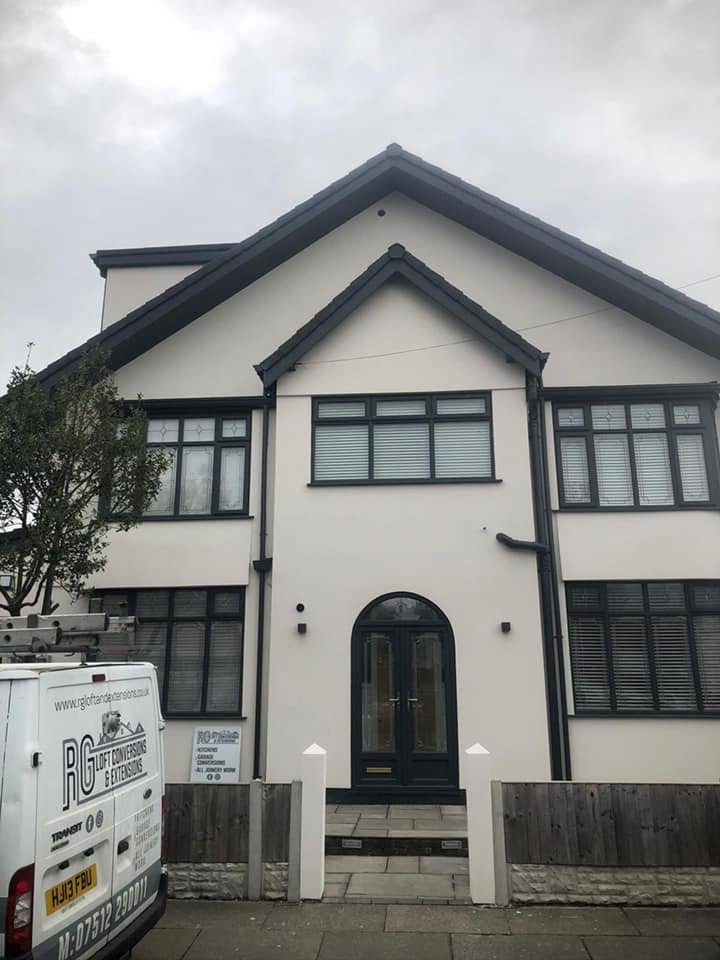 Large detached white-rendered property with dormer — built by RG