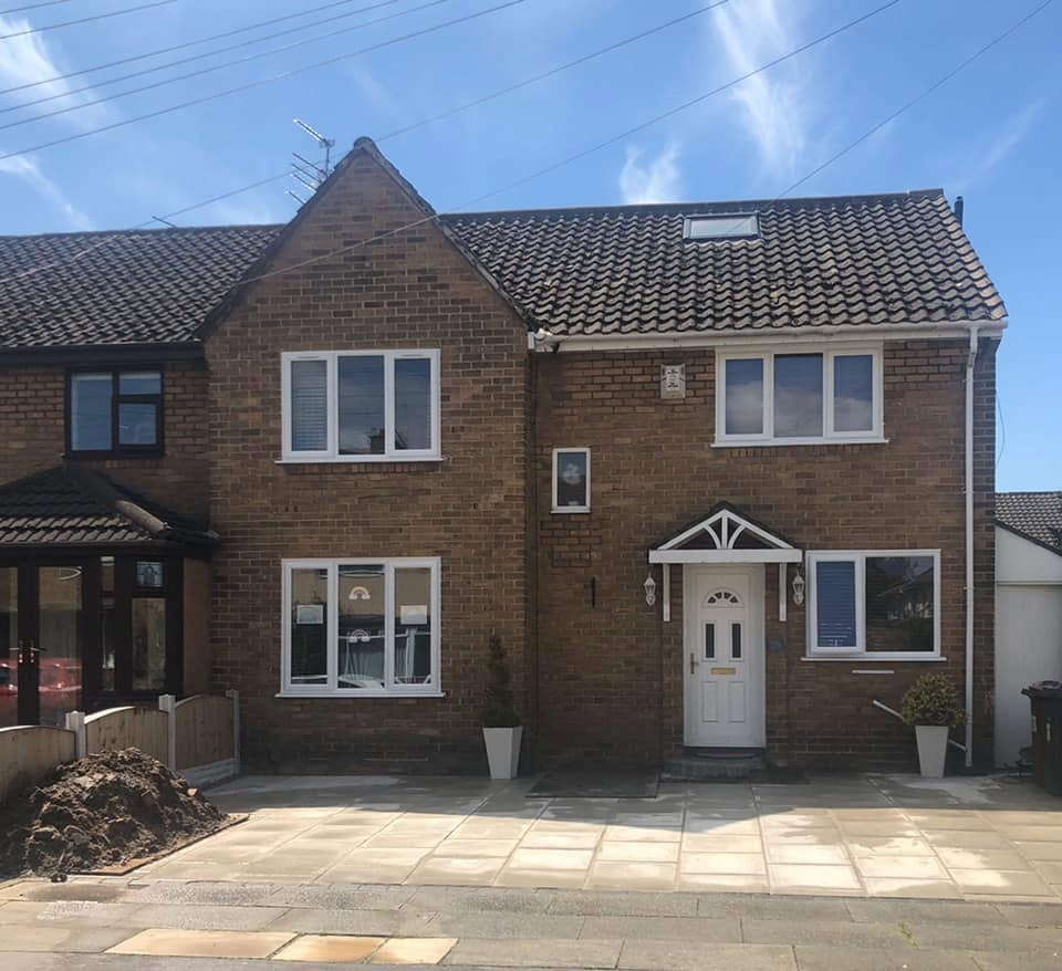 Brick semi-detached house before RG two-storey extension and render works
