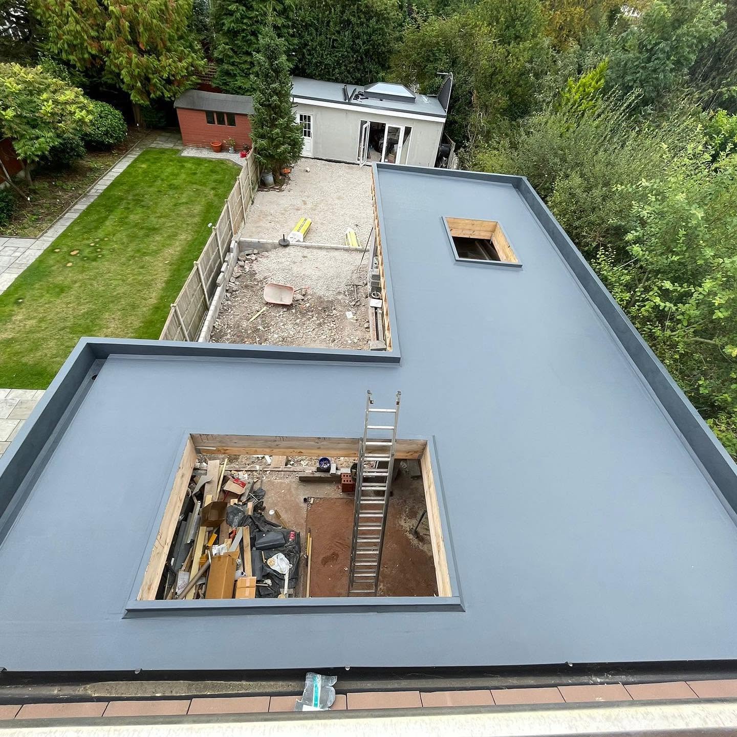 New EPDM flat roof installed above a single-storey extension